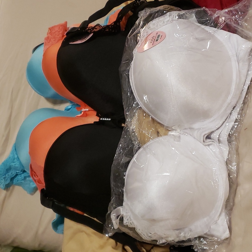 Angelina Bras size 42DD two white, 1 purple, 1 black, 1 coral, 1 turquoise